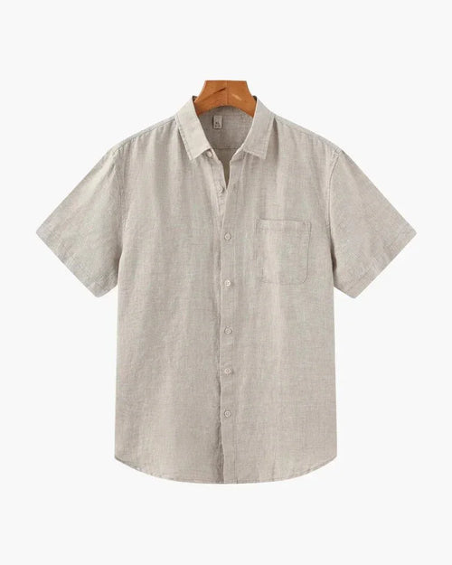 Men's beige linen short sleeve shirt with front pocket on hanger